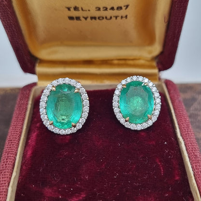 7.41ct Oval Emerald and Diamond Halo Cluster Stud Earrings