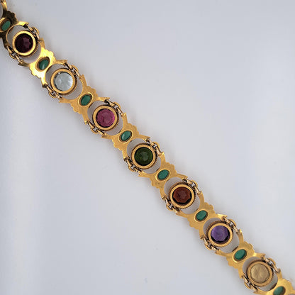 Edwardian Antique Multi Gemstone and Yellow Gold Bracelet, with amethyst, garnet, peridot, aquamarine, tourmaline, citrine and emeralds