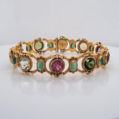 Edwardian Antique Multi Gemstone and Yellow Gold Bracelet, with amethyst, garnet, peridot, aquamarine, tourmaline, citrine and emeralds
