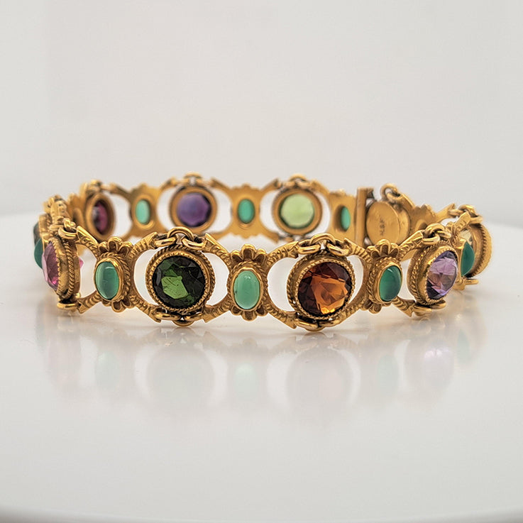 Edwardian Antique Multi Gemstone and Yellow Gold Bracelet, with amethyst, garnet, peridot, aquamarine, tourmaline, citrine and emeralds