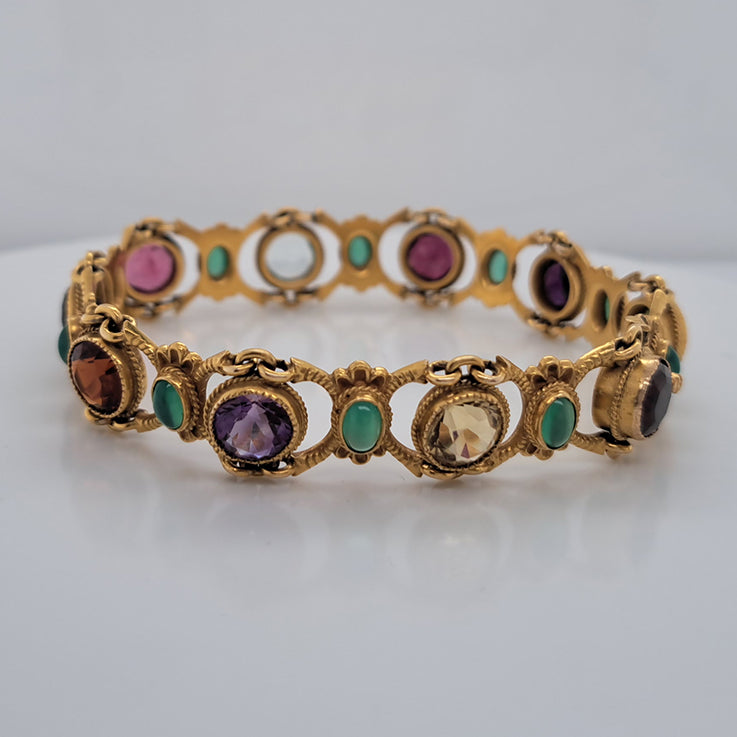 Edwardian Antique Multi Gemstone and Yellow Gold Bracelet, with amethyst, garnet, peridot, aquamarine, tourmaline, citrine and emeralds