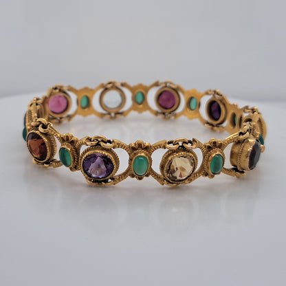 Edwardian Antique Multi Gemstone and Yellow Gold Bracelet, with amethyst, garnet, peridot, aquamarine, tourmaline, citrine and emeralds