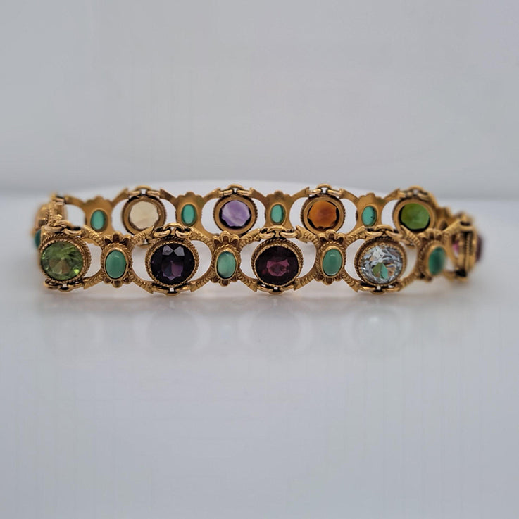 Edwardian Antique Multi Gemstone and Yellow Gold Bracelet, with amethyst, garnet, peridot, aquamarine, tourmaline, citrine and emeralds