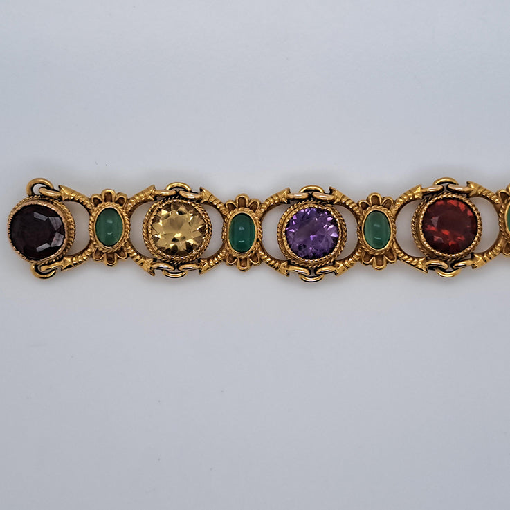 Edwardian Antique Multi Gemstone and Yellow Gold Bracelet, with amethyst, garnet, peridot, aquamarine, tourmaline, citrine and emeralds