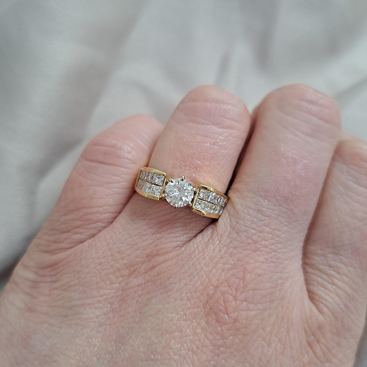 Vintage 0.65ct Diamond Solitaire Engagement Ring with Princess Diamond Shoulders