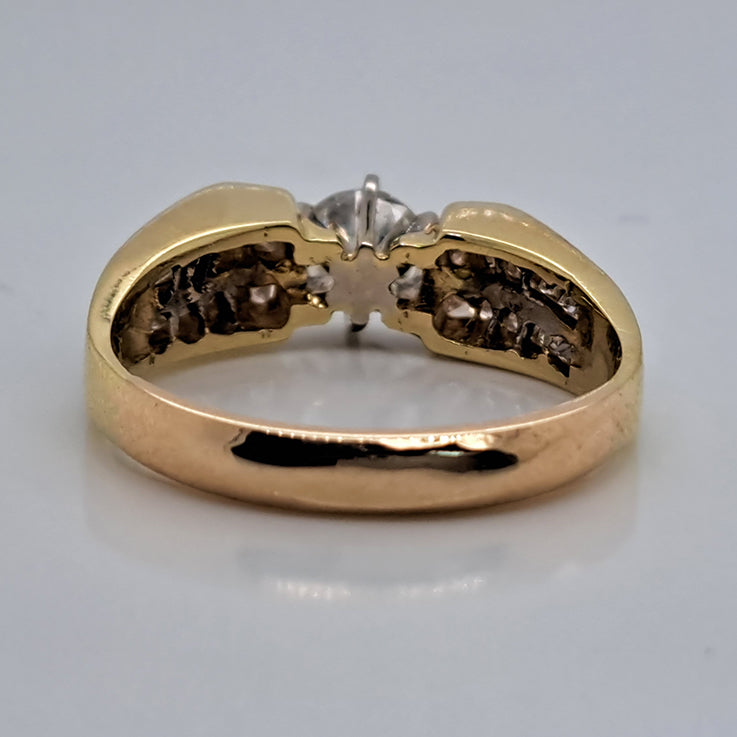 Vintage 0.65ct Diamond Solitaire Engagement Ring with Princess Diamond Shoulders