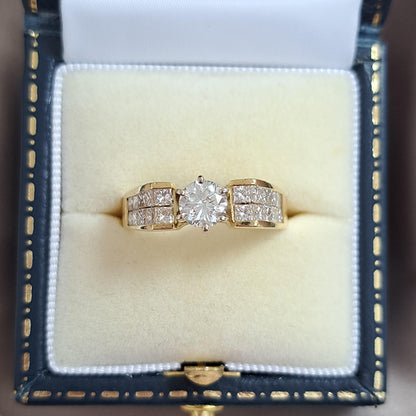 Vintage 0.65ct Diamond Solitaire Engagement Ring with Princess Diamond Shoulders