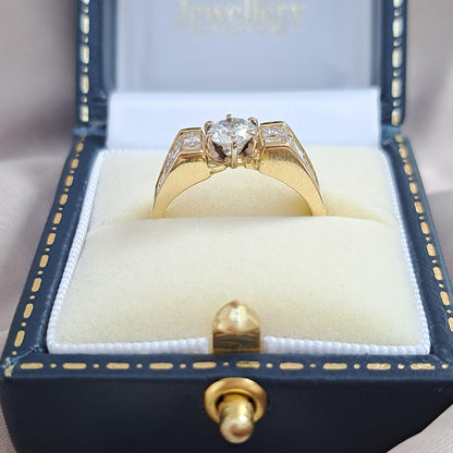 Vintage 0.65ct Diamond Ring with Princess Diamond Shoulders