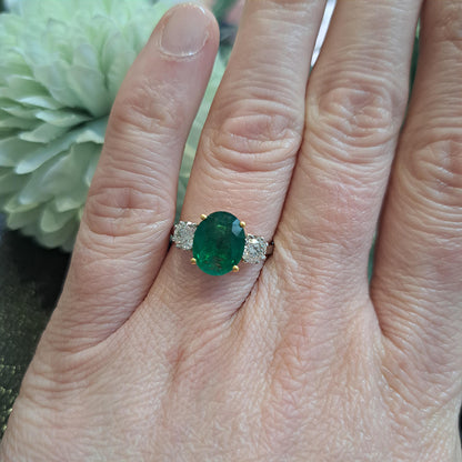 2.44ct Oval Emerald and Diamond Three Stone Engagement Ring
