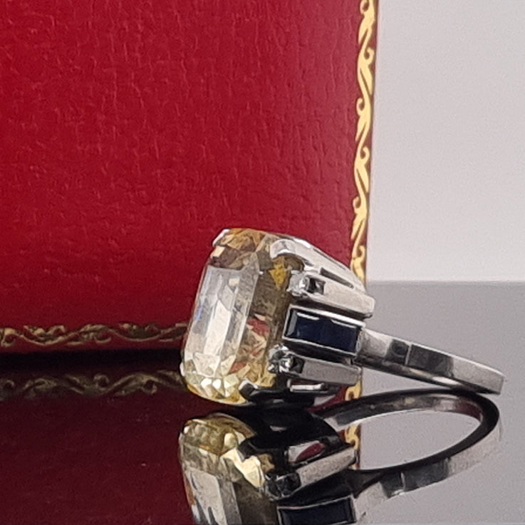 Vintage 1940s Retro 16cts Cushion Cut Yellow Sapphire Ring with Blue Sapphire and Diamond Shoulders in Platinum