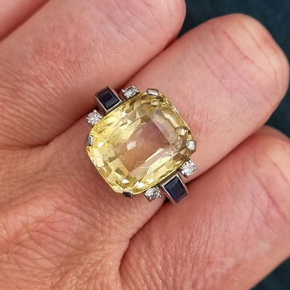 Vintage 1940s Retro 16cts Cushion Cut Yellow Sapphire Ring with Blue Sapphire and Diamond Shoulders in Platinum