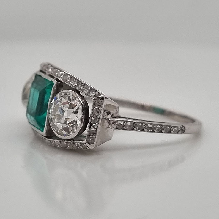 Edwardian Antique 1.40ct Emerald and 1.30ct Old Cut Diamond Three Stone Engagement Ring in Platinum