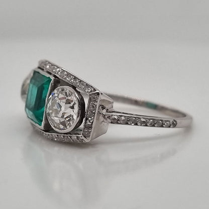 Edwardian Antique 1.40ct Emerald and 1.30ct Old Cut Diamond Three Stone Engagement Ring in Platinum