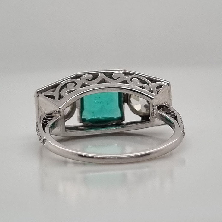 Edwardian Antique 1.40ct Emerald and 1.30ct Old Cut Diamond Three Stone Engagement Ring in Platinum
