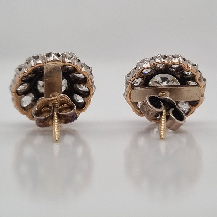 Victorian Antique 2.90ct Old Cut Diamond Cluster Stud Earrings, 0.70ct old-cut diamond centres surrounded by smaller old-cut diamonds, 2.90 carat total