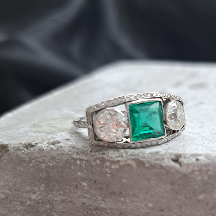 Edwardian Antique 1.40ct Emerald and 1.30ct Old Cut Diamond Three Stone Engagement Ring in Platinum