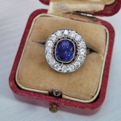 Vintage Certified Natural Colour Change Sapphire and Diamond Cluster Ring. Colour change sapphire is blue in natural light and purple in indoor lighting