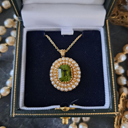 Antique Peridot and Pearl Cluster Pendant, 3.50ct octagonal cut peridot set within double surround of seed pearls in yellow gold. Circa 1830
