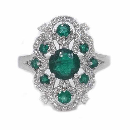 Decorative 1.13ct Emerald and Diamond Cluster Dress Ring, 1.13 carat emerald nestled within entwinned loop diamond surround with emerald accents in 18ct white gold