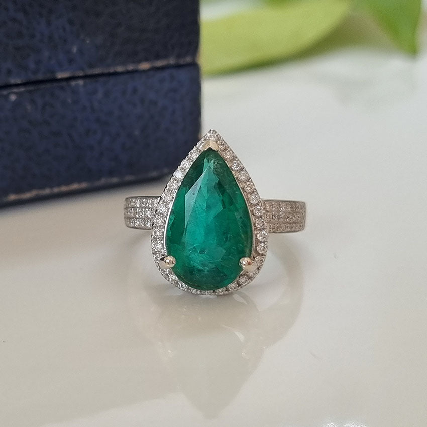 6.91ct Pear Cut Emerald and Diamond Cluster Ring in 18ct White Gold