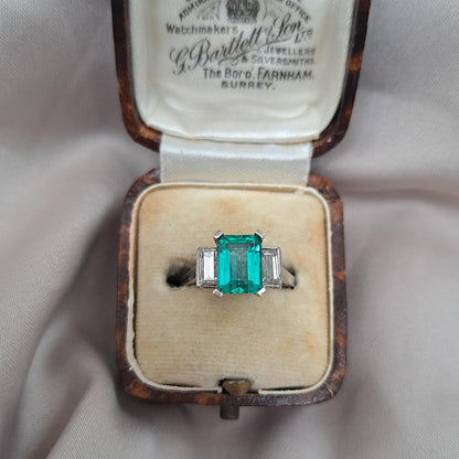 Colombian Emerald and Baguette Diamond Three Stone Engagement Ring in Platinum