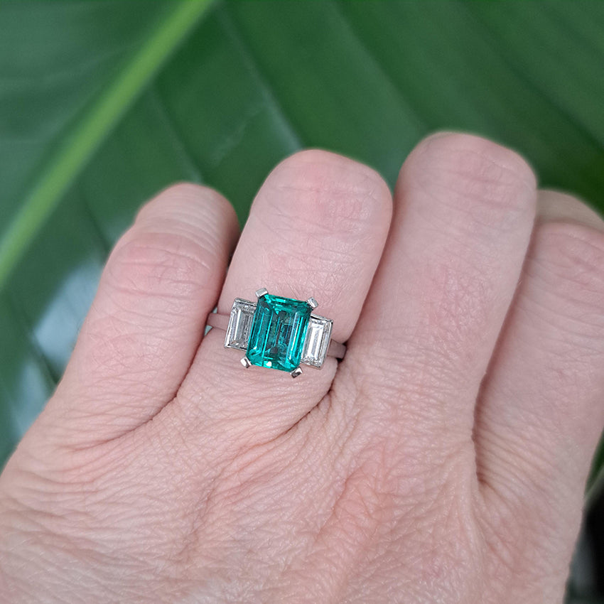 Colombian Emerald and Baguette Diamond Three Stone Engagement Ring in Platinum