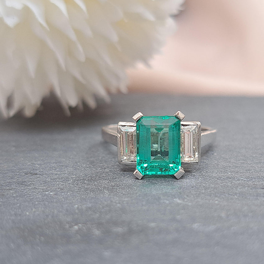 Colombian Emerald and Baguette Diamond Three Stone Engagement Ring in Platinum