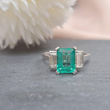 Colombian Emerald and Baguette Diamond Three Stone Engagement Ring in Platinum