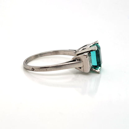 Colombian Emerald and Baguette Diamond Three Stone Engagement Ring in Platinum