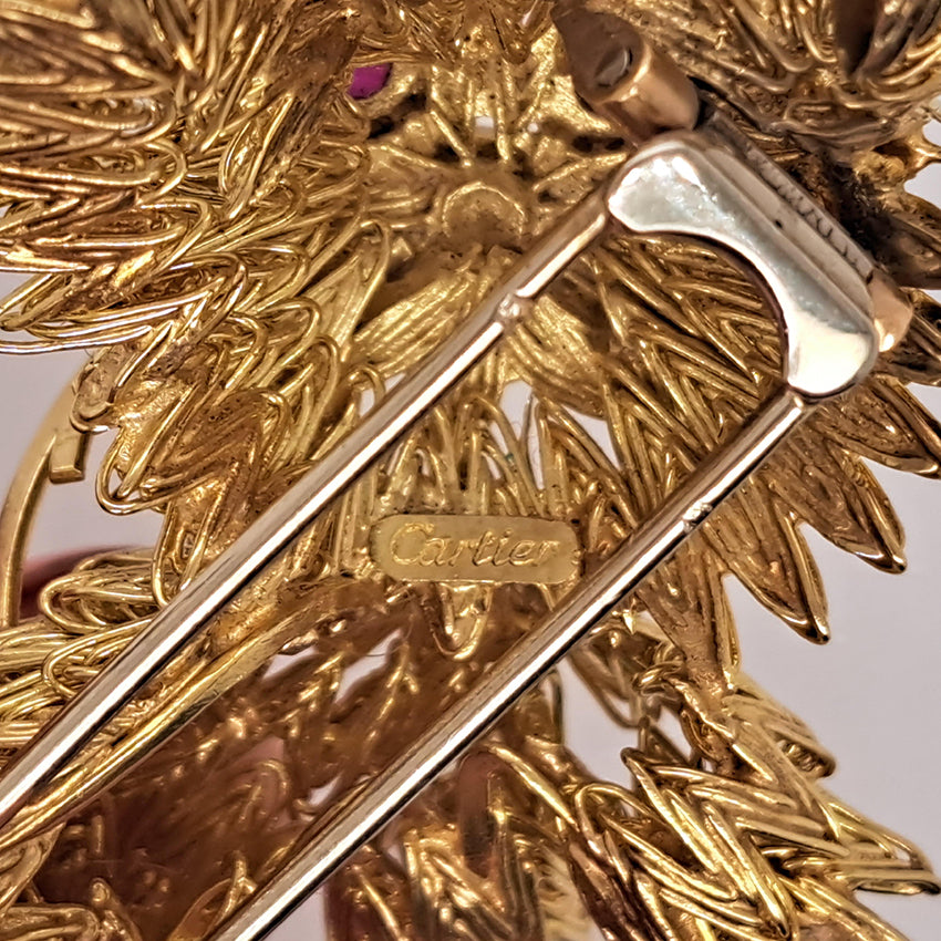 Cartier Vintage 18ct Gold Dog Brooch with Diamond and Ruby, ruby eyes and diamond accents to the tail. Circa 1960s. Signed Cartier and Numbered 019177
