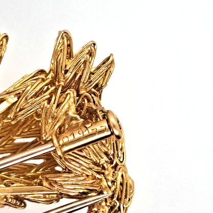 Cartier Vintage 18ct Gold Dog Brooch with Diamond and Ruby, ruby eyes and diamond accents to the tail. Circa 1960s. Signed Cartier and Numbered 019177