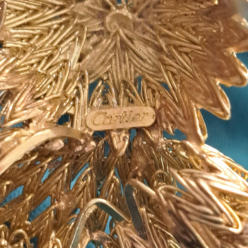 Cartier Vintage 18ct Gold Dog Brooch with Diamond and Ruby, ruby eyes and diamond accents to the tail. Circa 1960s. Signed Cartier and Numbered 019177