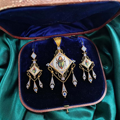 Antique Italian Micromosaic and Gold Pendant Brooch Earrings Suite, decorated with micromosaic fly beetle on blue red and white background in yellow gold with granulated Etruscan style work. Circa 1870. Comes in a Marchesini, Firenze Roma, fitted case