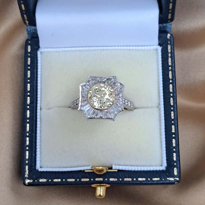 GIA Certified 2.03ct Fancy Yellow Diamond and Baguette White Diamond Cluster Ring