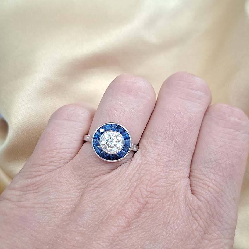 1.21ct Diamond and Calibre Sapphire Target Engagement Ring