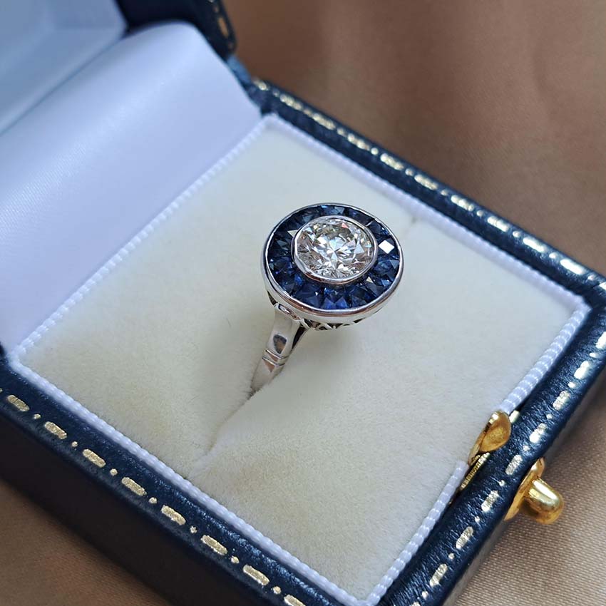 1.21ct Diamond and Calibre Sapphire Target Engagement Ring