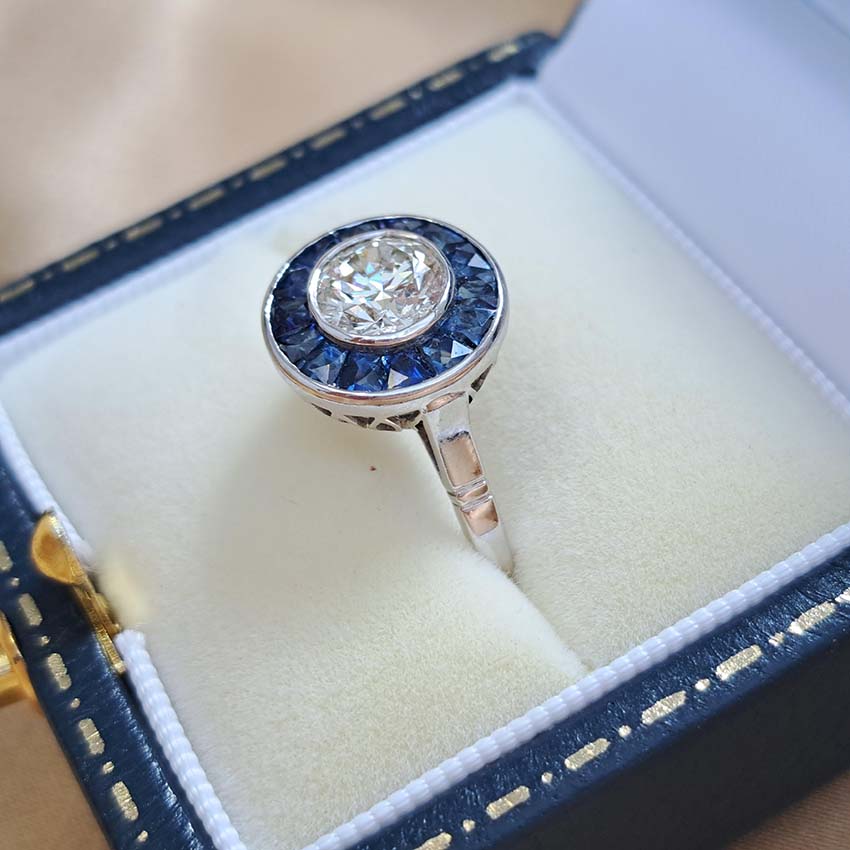 1.21ct Diamond and Calibre Sapphire Target Engagement Ring