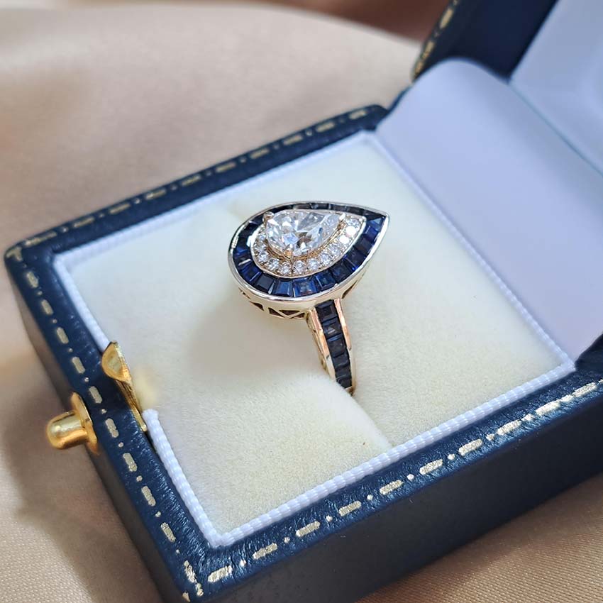 1ct Pear Cut Diamond and Sapphire Target Cluster Engagement Ring