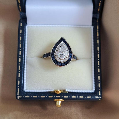 1ct Pear Cut Diamond and Sapphire Target Cluster Engagement Ring