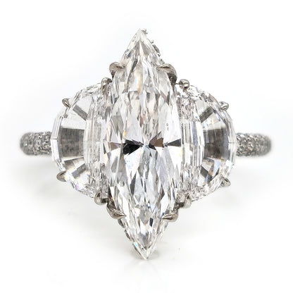Fine Marquise Diamond Ring with Half Moon Shoulders, 1.67ct marquise-cut diamond flanked by a half moon diamond either side in platinum with single cut diamonds set to the gallery and three outer edges of the shank
