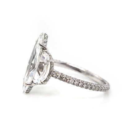 Fine Marquise Diamond Ring with Half Moon Shoulders, 1.67ct marquise-cut diamond flanked by a half moon diamond either side in platinum with single cut diamonds set to the gallery and three outer edges of the shank