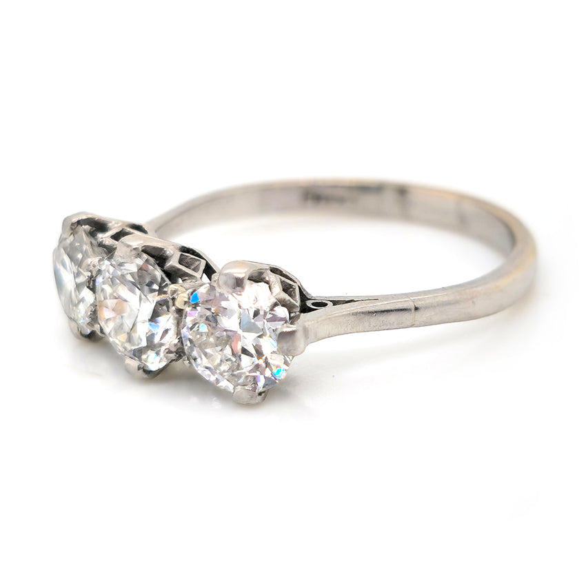 Art Deco 1.95ct Old Cut Diamond Three Stone Engagement Ring, set with three old European transitional cut diamonds in platinum, Circa 1920s