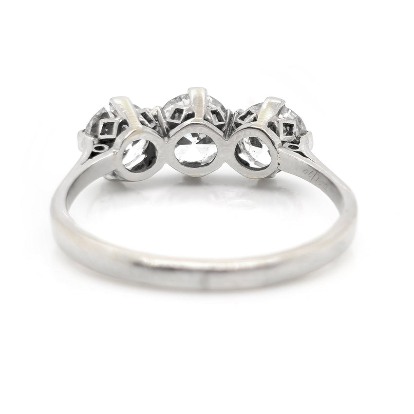 Art Deco 1.95ct Old Cut Diamond Three Stone Engagement Ring, set with three old European transitional cut diamonds in platinum, Circa 1920s