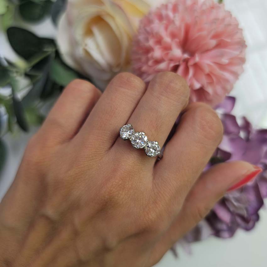 Art Deco 1.95ct Old Cut Diamond Three Stone Engagement Ring, set with three old European transitional cut diamonds in platinum, Circa 1920s