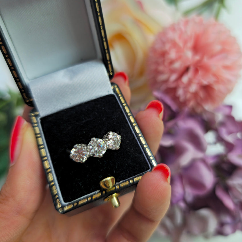 Art Deco 1.95ct Old Cut Diamond Three Stone Engagement Ring, set with three old European transitional cut diamonds in platinum, Circa 1920s