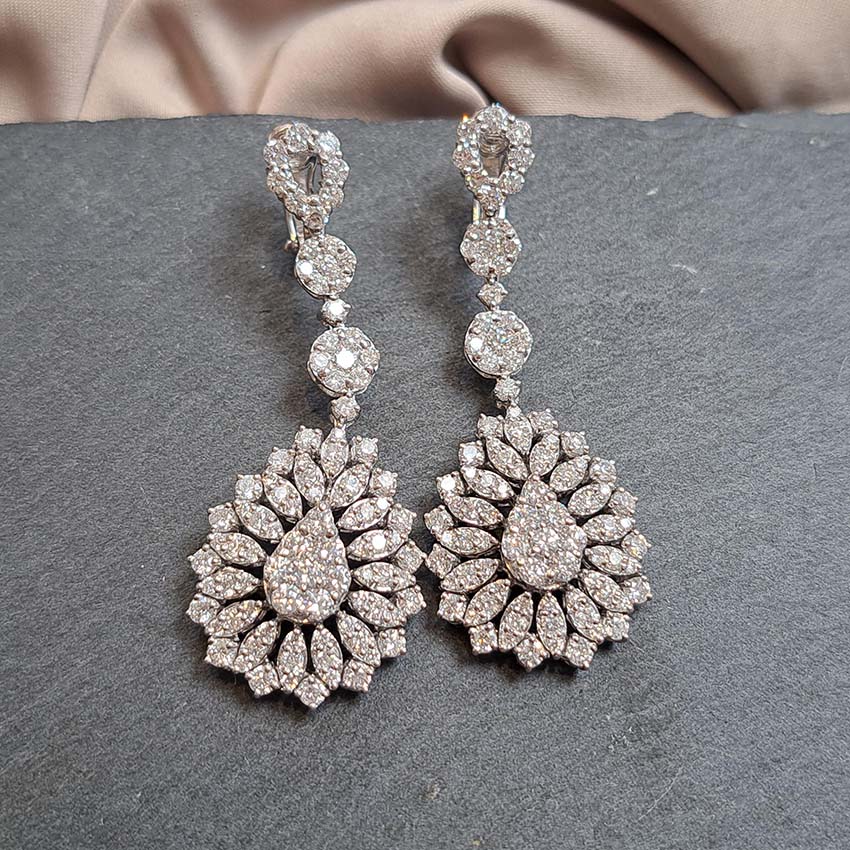 6ct Diamond Pear Shaped Cluster Drop Earrings, 6 carats of sparkling round brilliant-cut diamonds arranged in pear shaped drops accented with marquise shaped surrounds in 18ct white gold