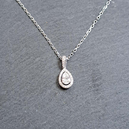 Pear Shaped Diamond Cluster Pendant and Chain with Certificate, certified VS2 0.43ct pear cut diamond surrounded by fixed diamond halo to a diamond set bail in 18ct white gold