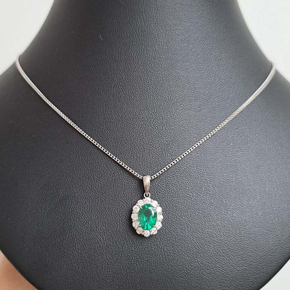 1.66ct Oval Emerald and Diamond Cluster Pendant with Chain