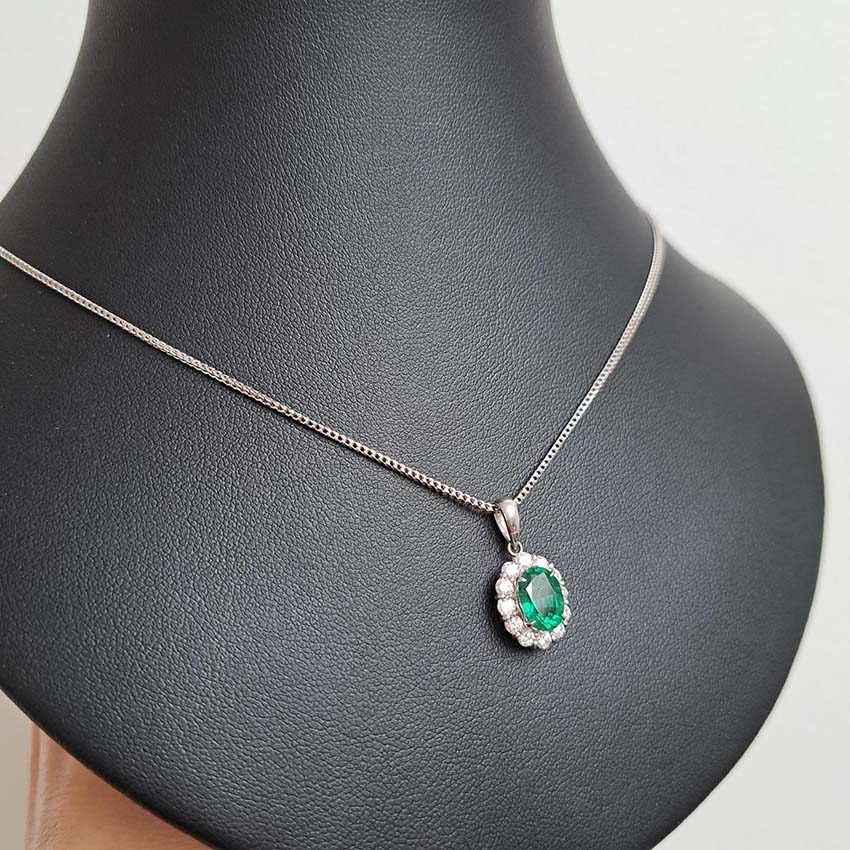1.66ct Oval Emerald and Diamond Cluster Pendant with Chain