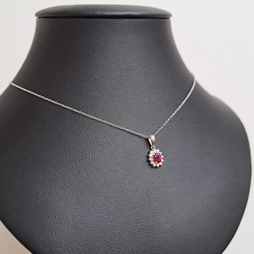 0.62ct Oval Ruby and Diamond Cluster Pendant with Chain